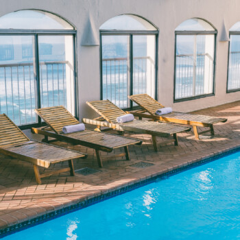 Take a dip in the enclosed rooftop swimming pool when you need a change of scenery from the beach.